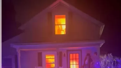 US firefighters rush to a residence after seeing realistic fire-themed Halloween decor